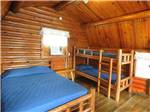 Interior bedroom at private cabin at MEMPHIS GRACELAND RV PARK & CAMPGROUND - thumbnail