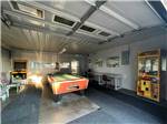 Inside of the game room with a pool table at WOLFIES CAMPGROUND - thumbnail