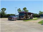 A couple of paved pull thru RV sites at TRADERS VILLAGE RV PARK - thumbnail