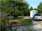 A motorhome in one of the RV sites at BARNYARD RV PARK - thumbnail