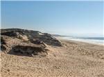 The sandy beach nearby at MARINA DUNES RV RESORT - thumbnail