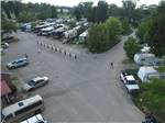 Kids playing in streets surrounded by RVs and Trailers at CAHOKIA RV PARQUE - thumbnail