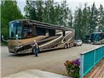 Motorhome pulling into at RIVER'S EDGE RV PARK & CAMPGROUND - thumbnail