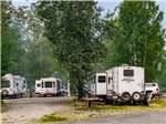 Campers in campsites at RIVER'S EDGE RV PARK & CAMPGROUND - thumbnail