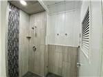 Private shower for guests at ALMOND TREE OASIS RV PARK - thumbnail