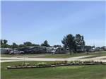 Multiple RVs parked on-site at AMANA RV PARK & EVENT CENTER - thumbnail