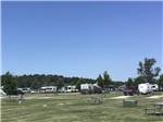 RVs parked on-site on sunny day at AMANA RV PARK & EVENT CENTER - thumbnail