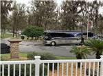 A Class A Motorhome pulling in at OCALA NORTH RV RESORT - thumbnail