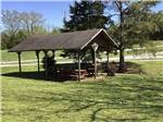 Some of the covered picnic benches at NATCHEZ TRACE RV PARK - thumbnail