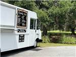 A catering truck parked at OAK PLANTATION CAMPGROUND - thumbnail