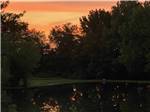 Sunset over the water at FERN LAKE CAMPGROUND & RV PARK - thumbnail