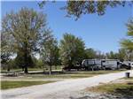 Some of the empty gravel sites at GRAND LAKE O' THE CHEROKEES RV RESORT BY RJOURNEY - thumbnail
