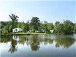 Trailers camping on the water at LAKE GEORGE ESCAPE CAMPGROUND - thumbnail