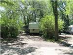 Fifth-wheel in a shady RV site at GORDON HOWE CAMPGROUND - thumbnail