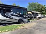 Class A motorhome in paved site at MOUNTAIN VIEW RV PARK - thumbnail