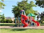 The colorful playground set at ROBIDOUX RV PARK - thumbnail