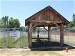 The covered fenced in pet area at ROCKWELL RV PARK - thumbnail