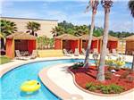 The lazy river with cabanas in the background at HOLLYWOOD CASINO RV PARK- GULF COAST - thumbnail