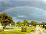 Rainbow over campground at SONRISE PALMS RV PARK - thumbnail