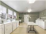 Inside of the modern laundry room at PINE CREST RV PARK OF NEW ORLEANS - thumbnail