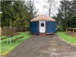 A yurt with a picnic bench at TILLAMOOK BAY CITY RV PARK - thumbnail