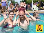 A family playing in the pool at MILTON KOA - thumbnail