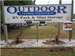 Business sign outside entrance at OUTDOOR LIVING CENTER RV PARK - thumbnail