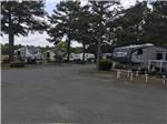Some of the campsites with trees at TRAVELCENTERS OF AMERICA RV PARK - thumbnail