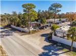 The road to the entrance of the park at GULF BREEZE RV RESORT - thumbnail