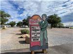 The front direction sign at ENCHANTED TRAILS RV PARK & TRADING POST - thumbnail