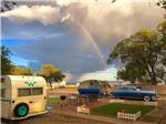 A rainbow going over the campground at ENCHANTED TRAILS RV PARK & TRADING POST - thumbnail