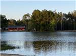 The red barn in a distance at LAKE HARMONY RV PARK AND CAMPGROUND - thumbnail