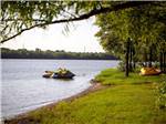 A couple of personal jet skis on the water at LOYD PARK CAMPING CABINS & LODGE - thumbnail