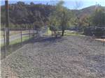 The fenced in pet area at MOUNTAIN GATE RV PARK - thumbnail