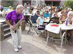 Saxophone player on the patio at TOWERPOINT RESORT - thumbnail