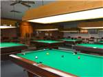 Pool tables in game room at APACHE WELLS RV RESORT - thumbnail