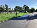 The road next to the playground at YELLOWSTONE GRIZZLY RV PARK - thumbnail