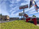 Park entrance with horse statue in front under sign at SCANDIA RV PARK - thumbnail