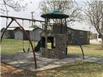 The playground equipment at MIDLAND RV CAMPGROUND - thumbnail