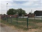 The fenced in pet area at MIDLAND RV CAMPGROUND - thumbnail