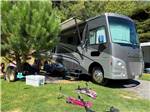 A Class A motorhome parked on-site at RIVER BEND RESORT - thumbnail