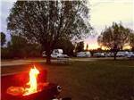 A fire in a barbecue pit at FORT BRIDGER RV PARK - thumbnail