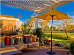 Shaded lounge area on beautiful day at PUEBLO EL MIRAGE RV & GOLF RESORT - thumbnail