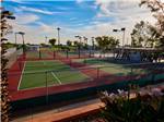 Tennis courts on a sunny day at GOLD CANYON RV & GOLF RESORT - thumbnail