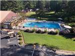 An aerial view of the pool and rec hall at COZY ACRES CAMPGROUND/RV PARK - thumbnail