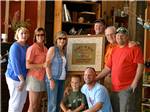 Group photo of people in large lodge at COZY ACRES CAMPGROUND/RV PARK - thumbnail