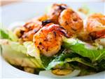 Grilled shrimp in a salad at WILDHORSE RESORT & CASINO RV PARK - thumbnail