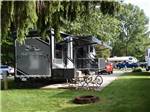 A trailer in a RV site at VACATION STATION RV RESORT - thumbnail