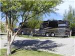 Big rig parked in a site at SLEEPING BEAR RV PARK & CAMPGROUND - thumbnail