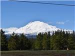 A large snow covered mountain nearby at GORGE BASE CAMP RV PARK - thumbnail